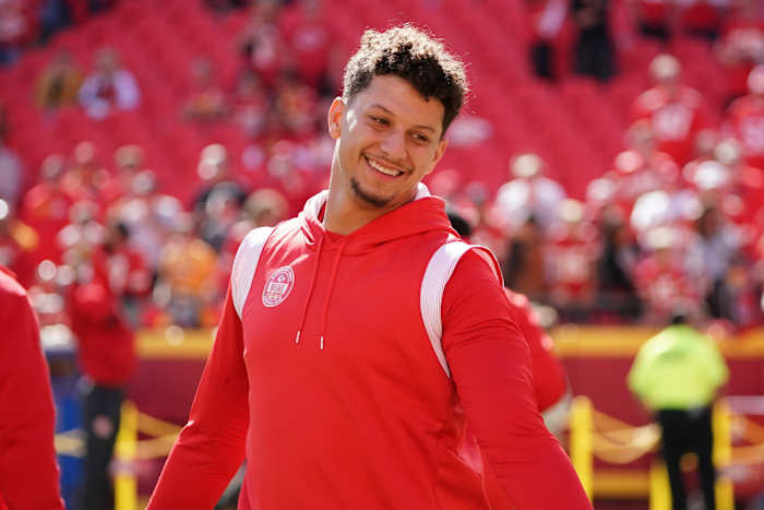 Oct 22, 2023; Kansas City, Missouri, USA; Kansas City Chiefs quarterback Patrick Mahomes (15) laughs during warm ups against the Los Angeles Chargers prior to a game at GEHA Field at Arrowhead Stadium. Mandatory Credit: Denny Medley-USA TODAY Sports